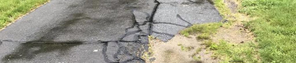 paving asphalt potholes cracking